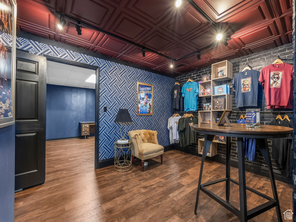 Home office with hardwood / wood-style flooring