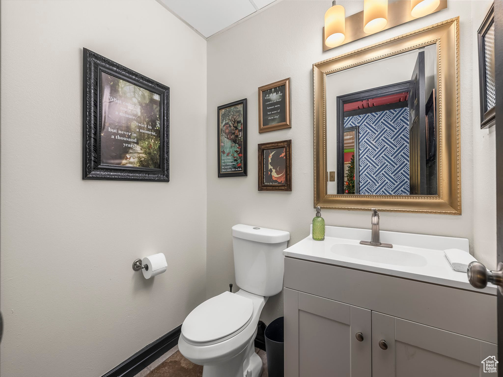 Bathroom with vanity and toilet