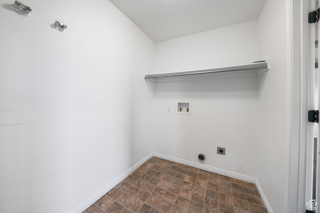 Washroom featuring washer hookup and hookup for an electric dryer