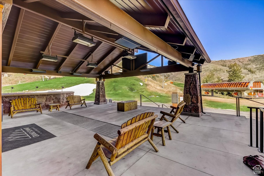 View of patio with a gazebo and a mountain view