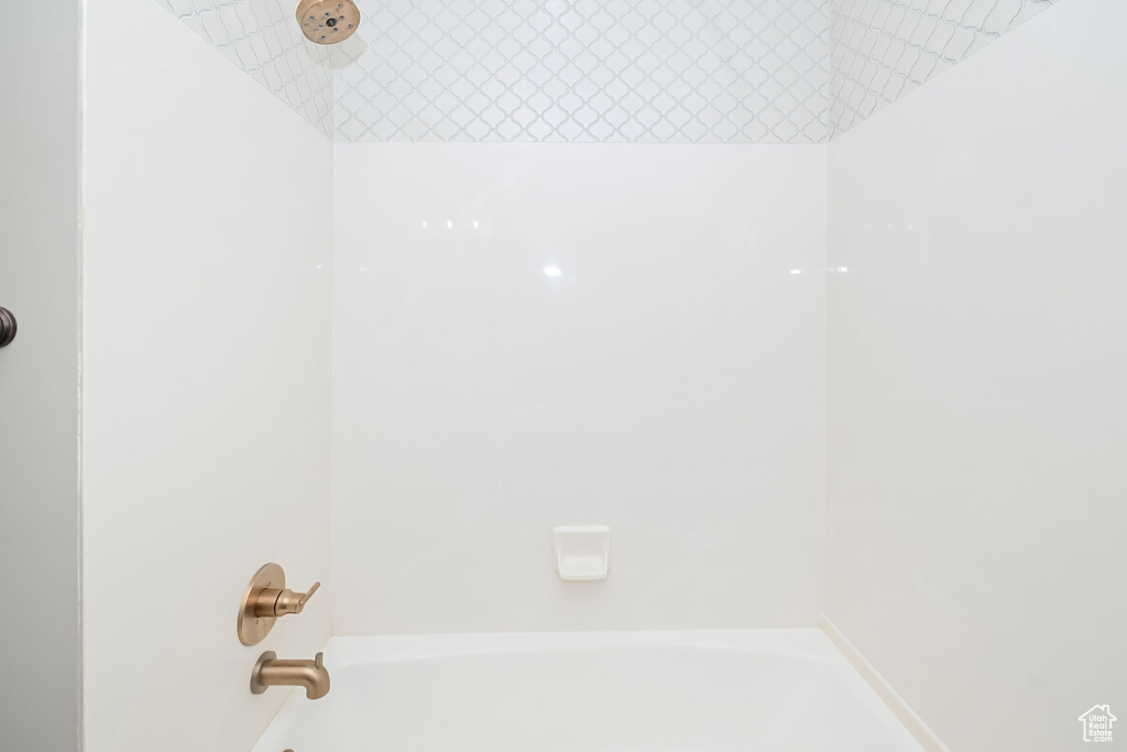 Bathroom featuring bathing tub / shower combination