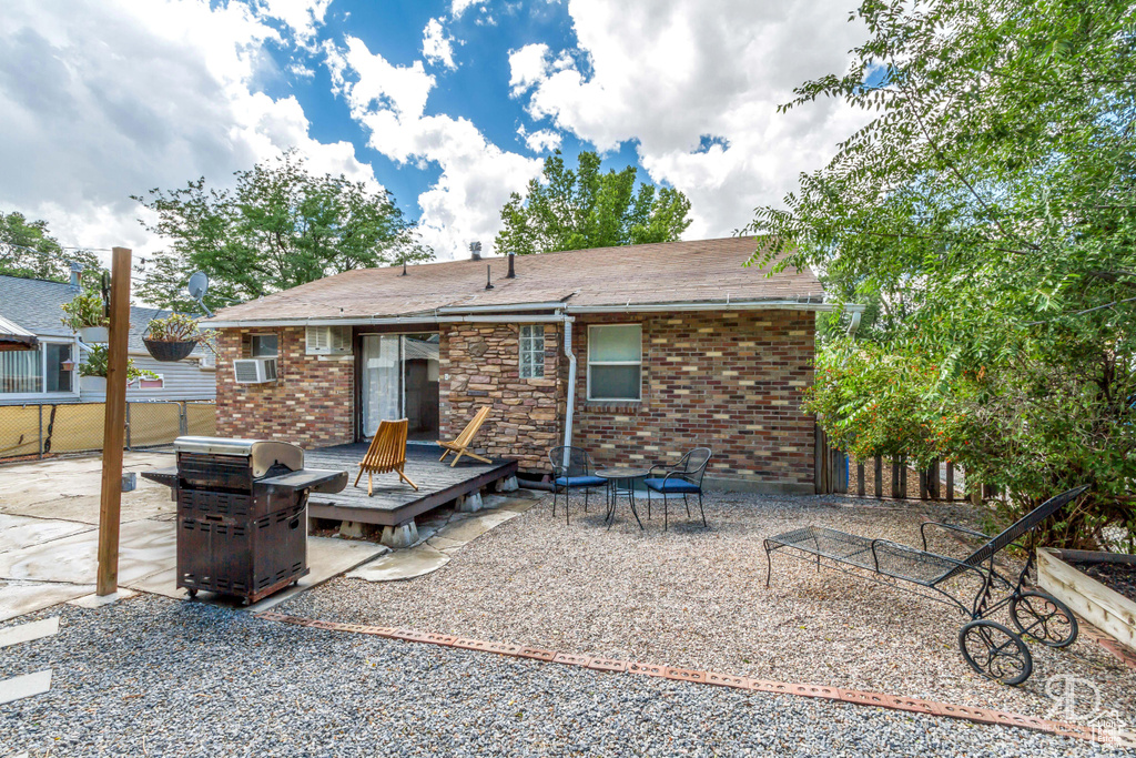 Back of property with cooling unit