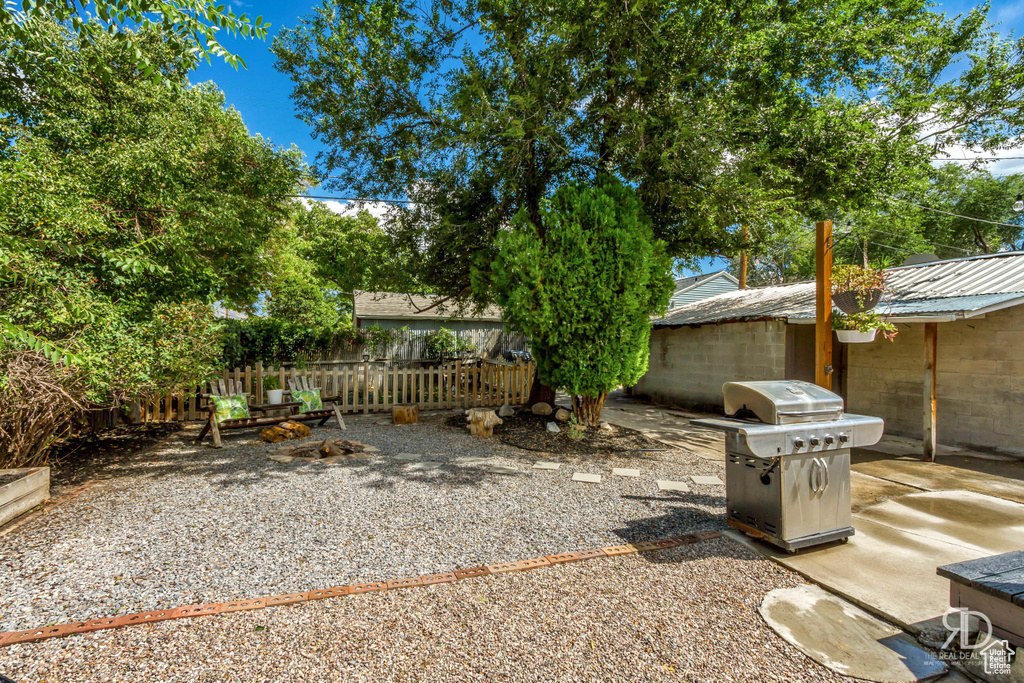 View of yard with a patio