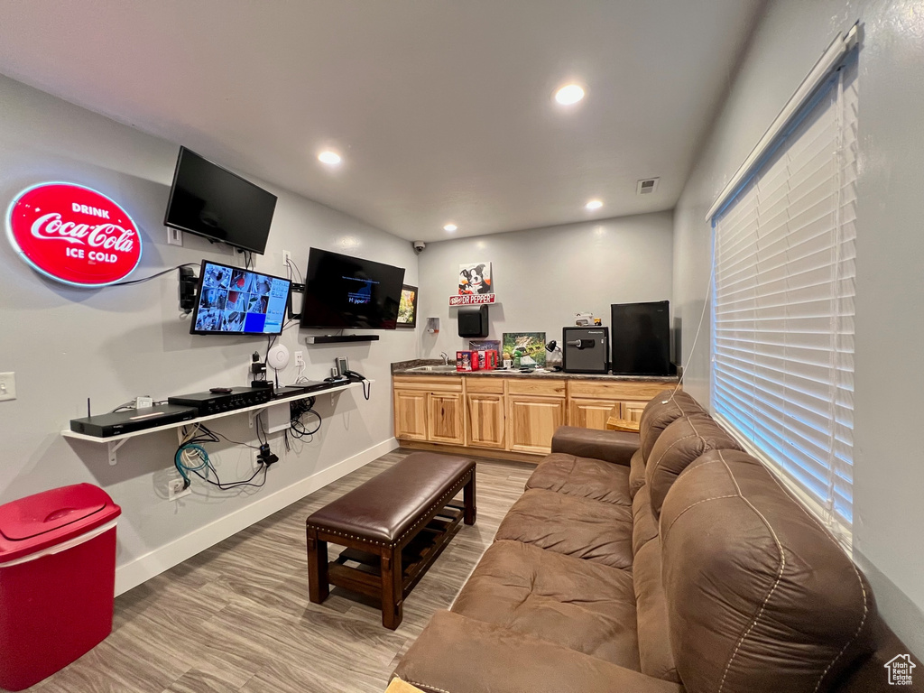 Living room featuring hardwood / wood-style flooring