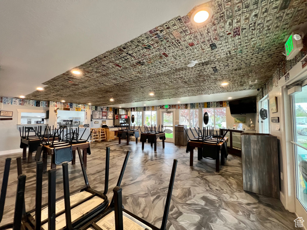 Dining area with brick ceiling