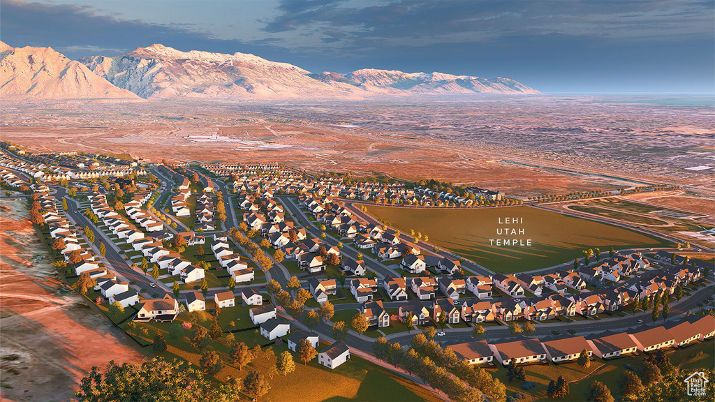 Birds eye view of property featuring a mountain view