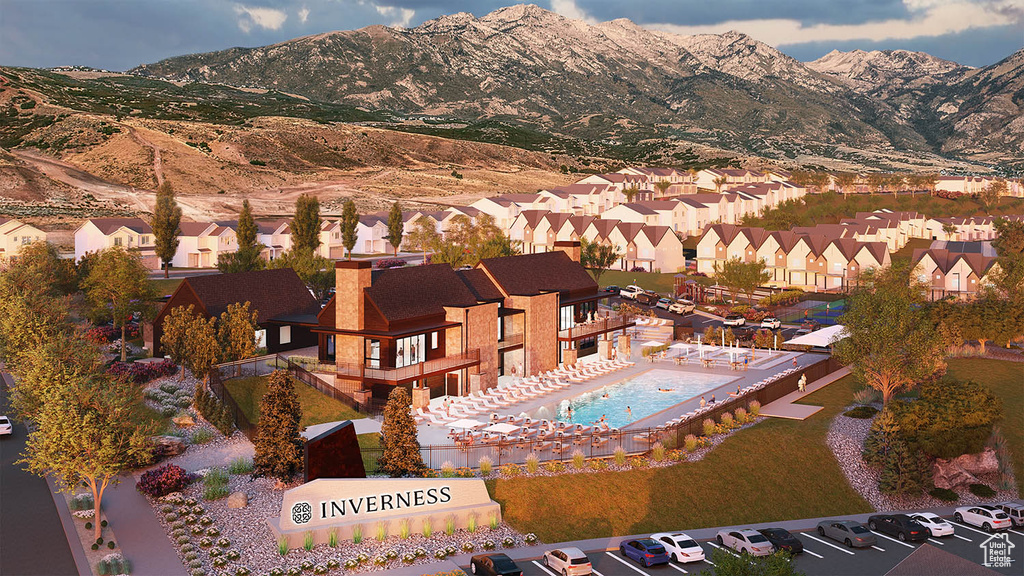 Birds eye view of property featuring a mountain view