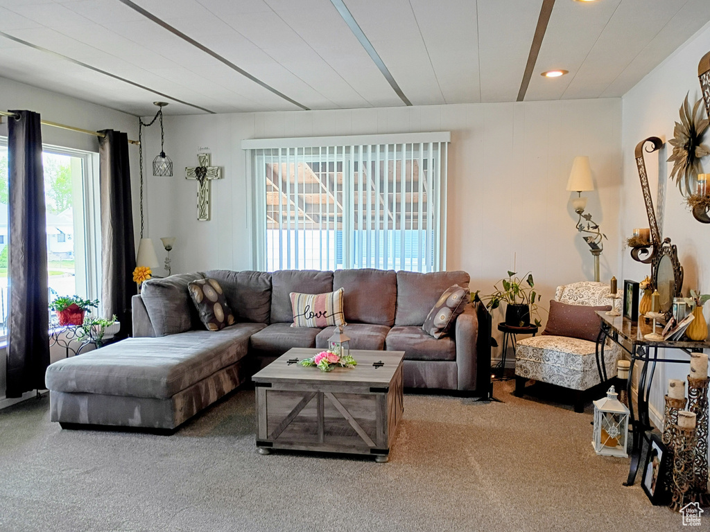 Living room featuring recessed lighting and carpet flooring