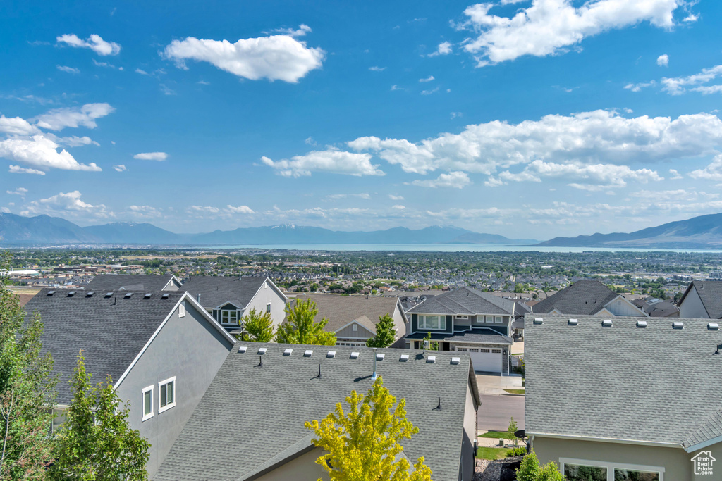 Water view with nearby suburban area and mountains