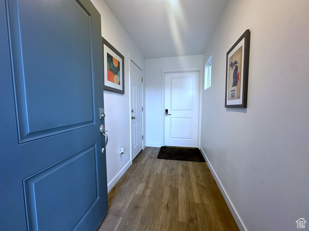 Doorway featuring hardwood / wood-style flooring