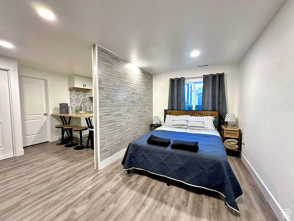 Bedroom featuring hardwood / wood-style floors