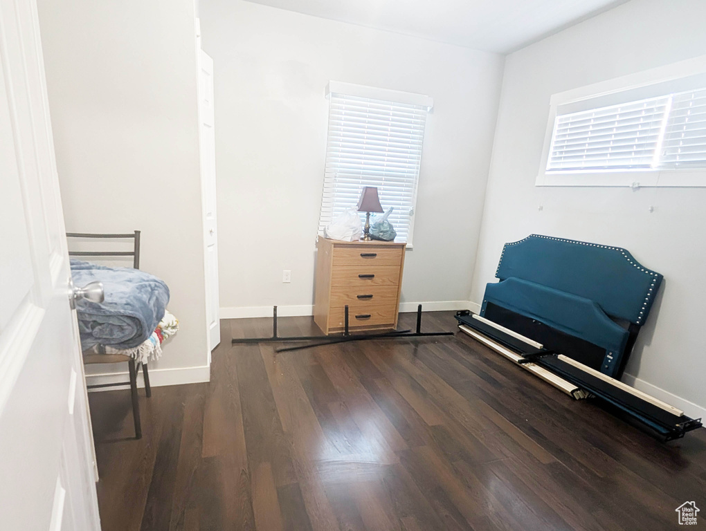 Interior space featuring dark hardwood / wood-style flooring
