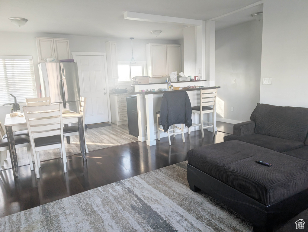 Living room with hardwood / wood-style floors
