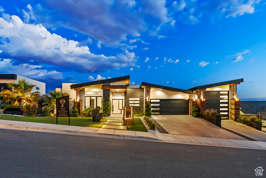Contemporary house featuring a garage