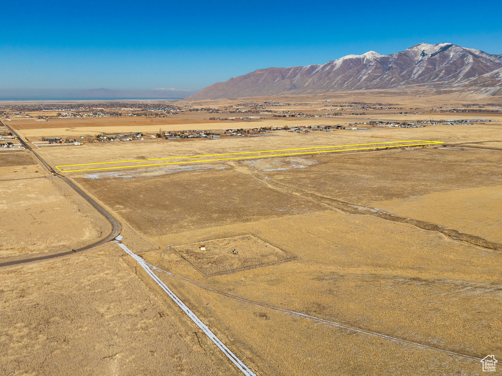 Property view of mountains with a rural view