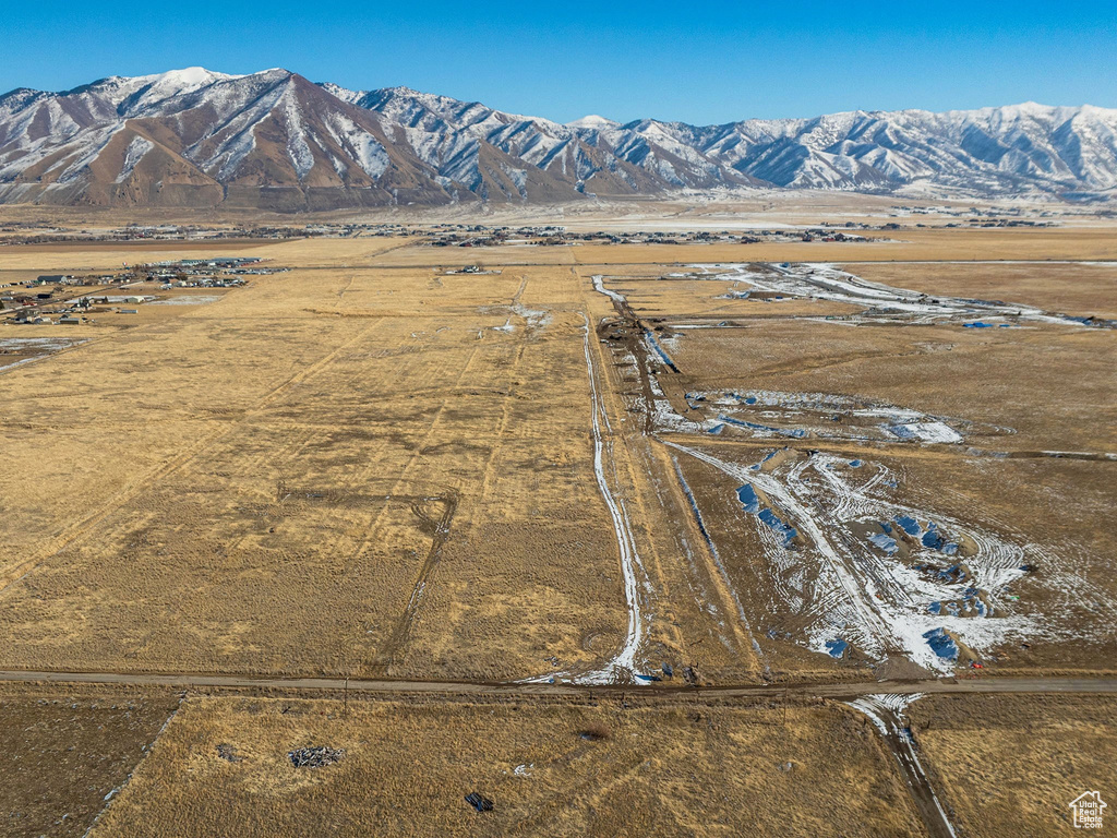 Drone / aerial view with a mountain view and a rural view