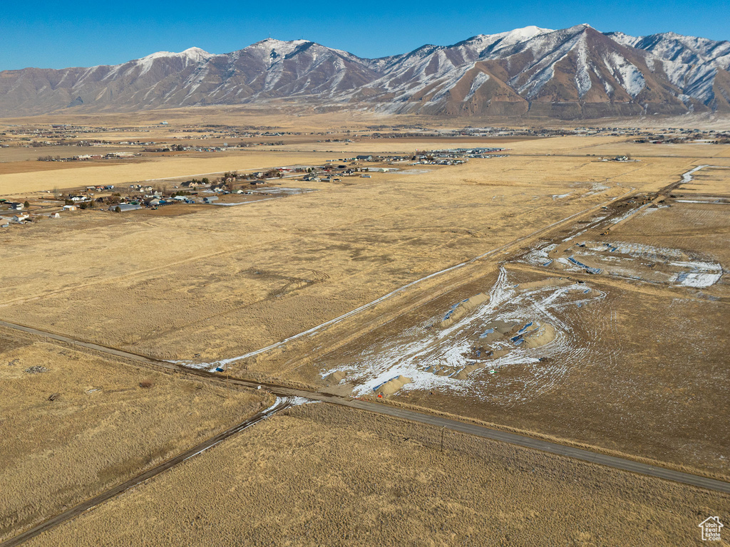 Property view of mountains with a rural view