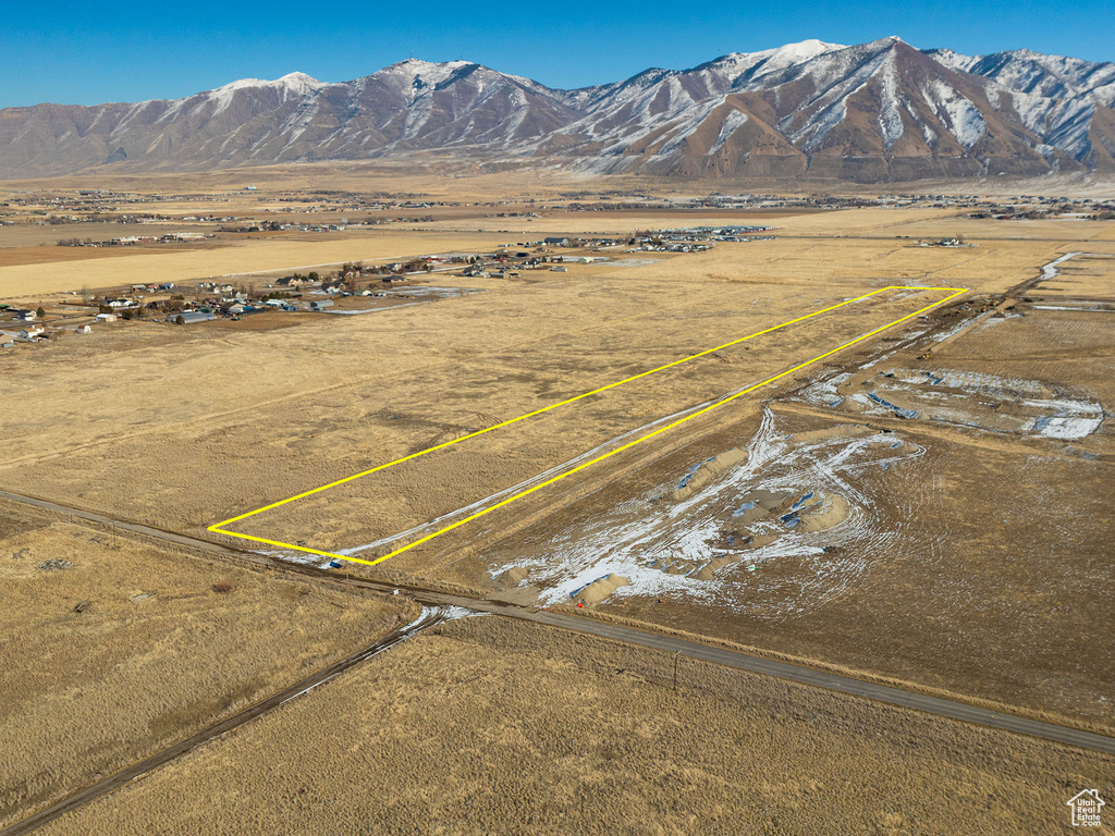 Birds eye view of property featuring a mountain view and a rural view