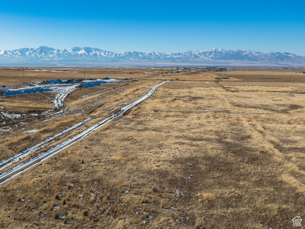 Birds eye view of property with a mountain view and a rural view