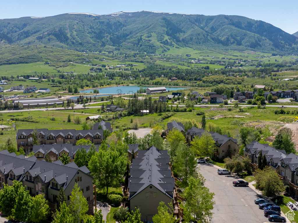 Aerial view of residential area with a water and mountain view
