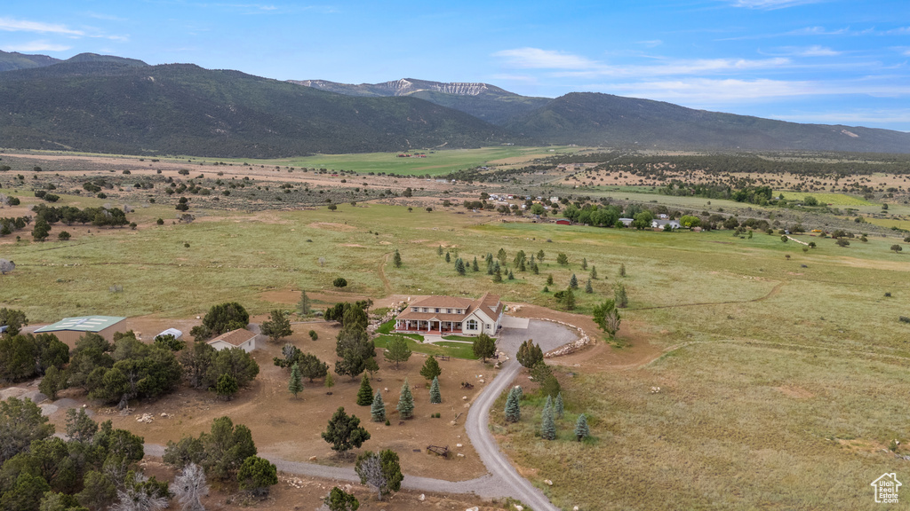 View of mountain background featuring rural landscape