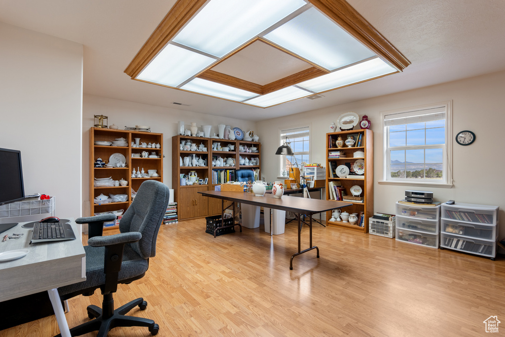 Home office featuring wood finished floors