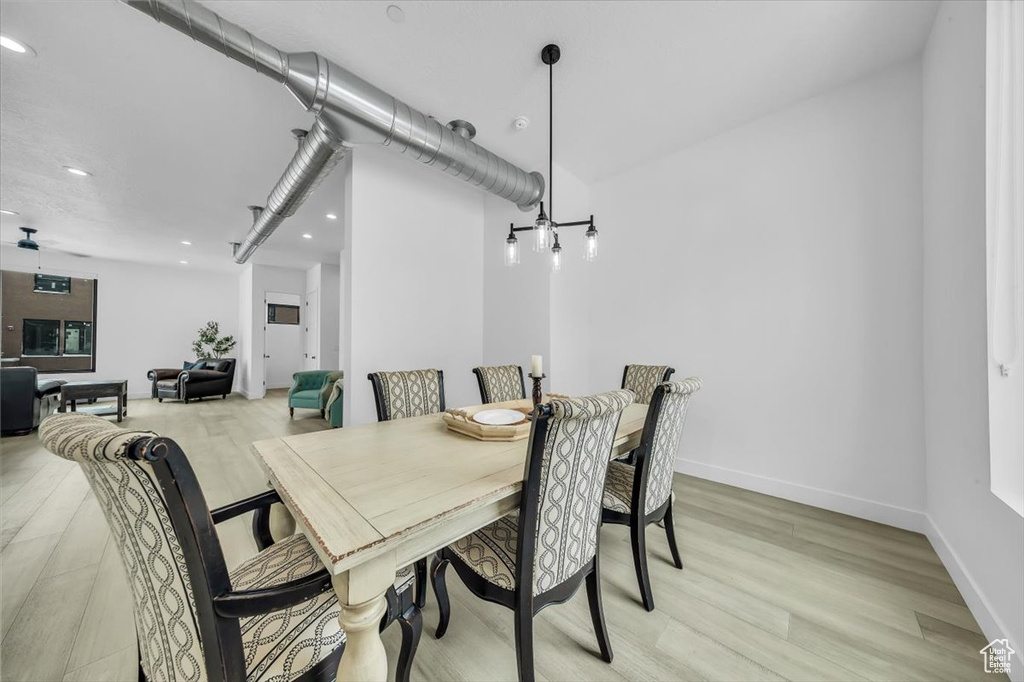 Dining space with recessed lighting, baseboards, and light wood-style floors