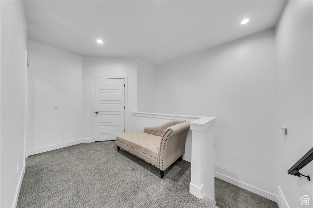 Sitting room featuring recessed lighting, baseboards, and carpet floors