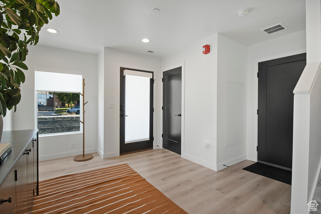 Entryway with light wood-type flooring