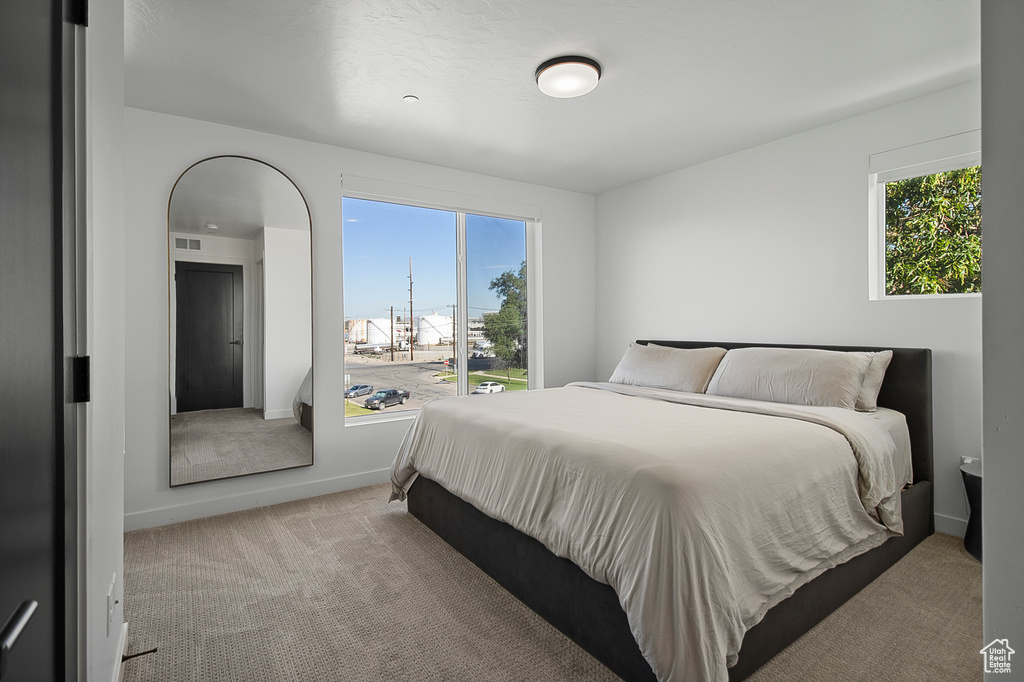 View of carpeted bedroom