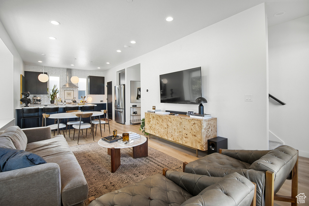 Living room featuring light hardwood / wood-style flooring