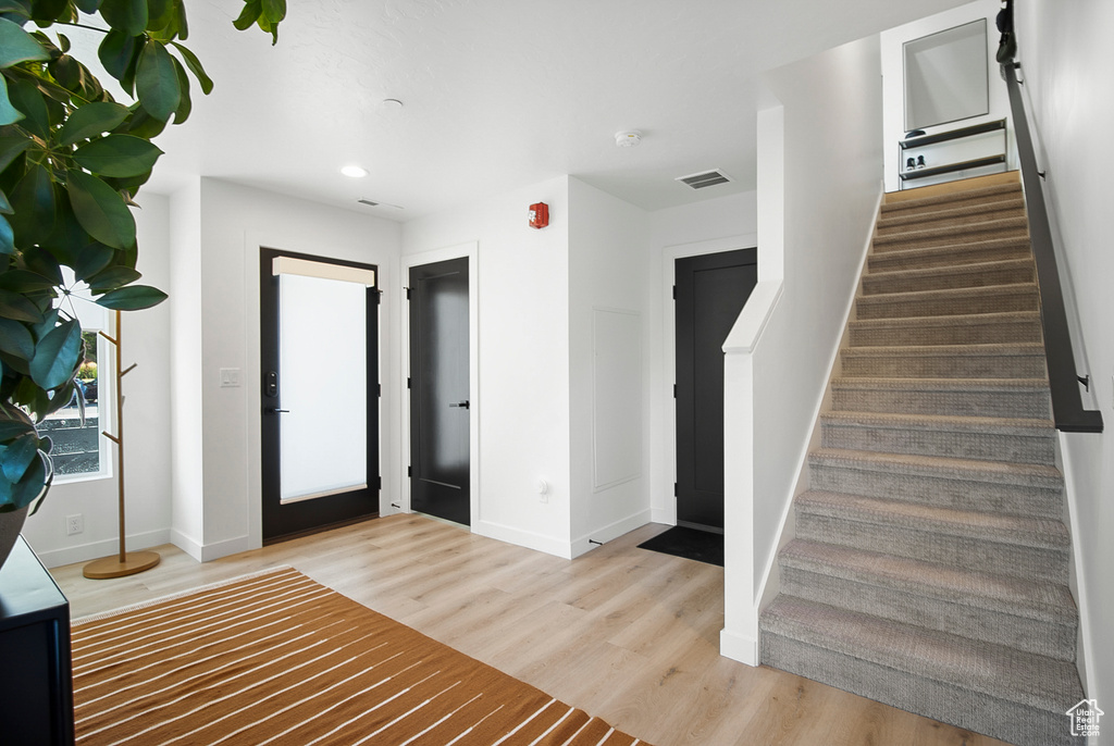 Entryway featuring wood-type flooring