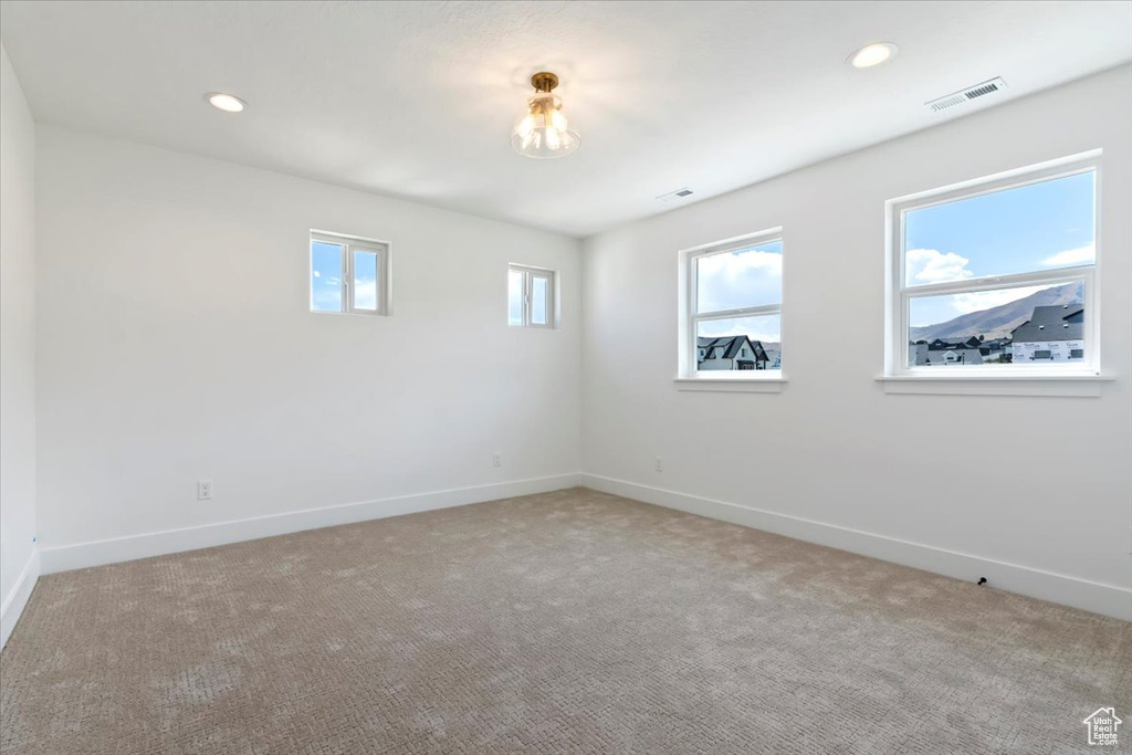 Unfurnished room featuring carpet floors