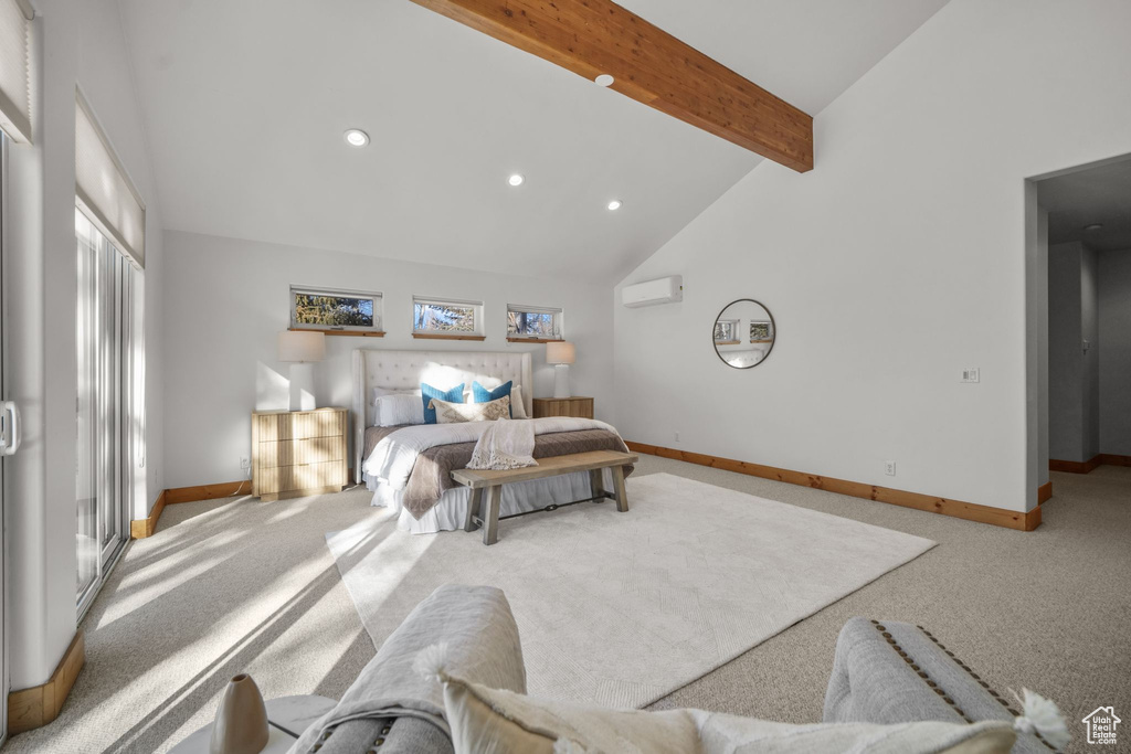 Carpeted bedroom with high vaulted ceiling, beam ceiling, and a wall mounted air conditioner