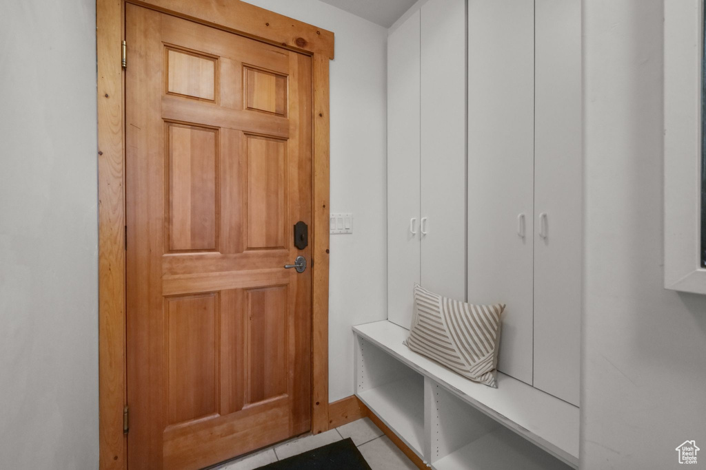 Mudroom featuring light tile patterned floors