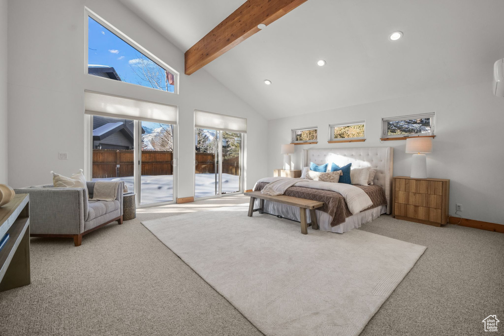 Bedroom with high vaulted ceiling, beam ceiling, access to outside, and carpet flooring