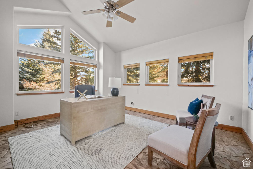 Office area with vaulted ceiling and ceiling fan