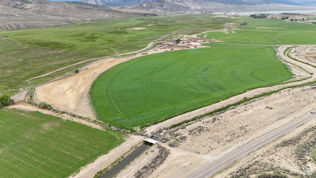 Overview of rural landscape with a mountain backdrop