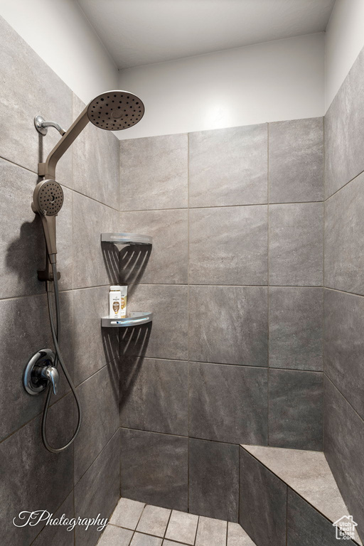 Bathroom with tiled shower