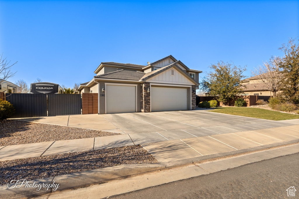 View of front of property with a garage