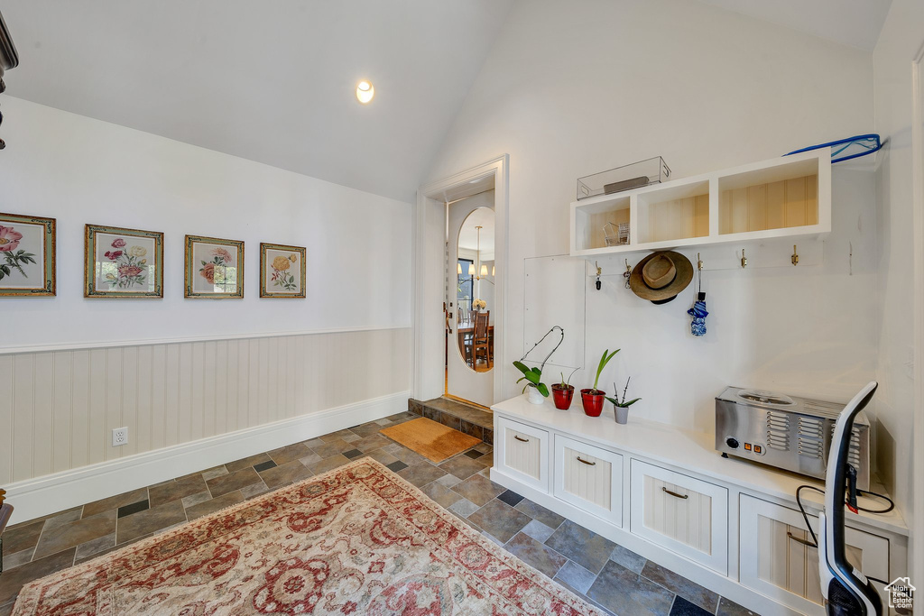 Mudroom with vaulted ceiling