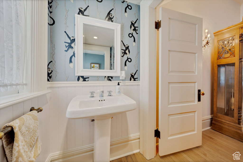 Bathroom featuring hardwood / wood-style floors and sink