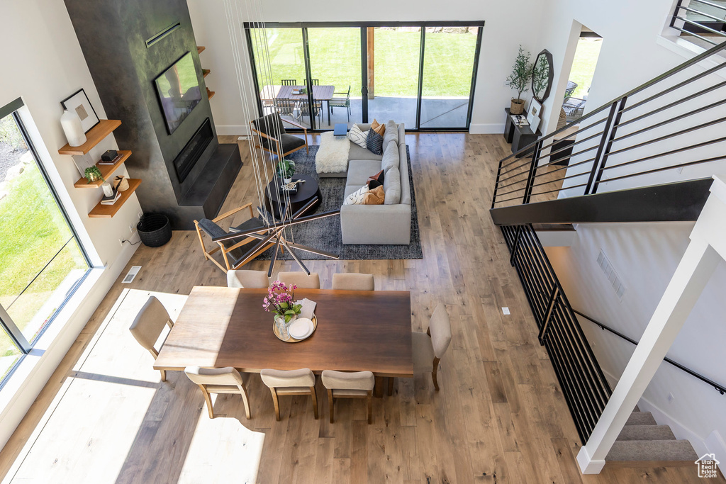 Living room with wood-type flooring and plenty of natural light