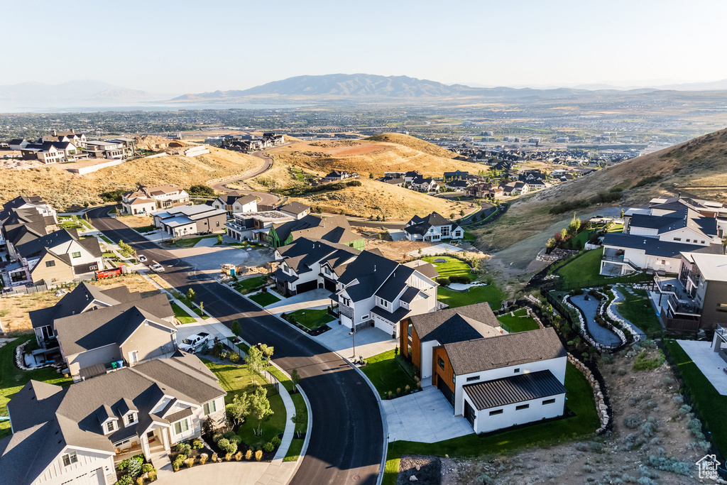 Birds eye view of property with a mountain view