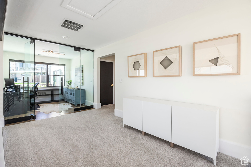 Interior space with light carpet