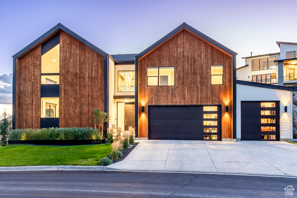 Contemporary home featuring a garage