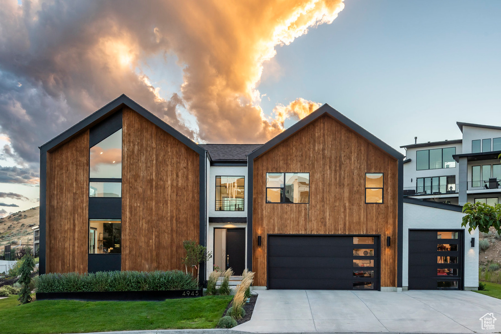 Contemporary house featuring a garage