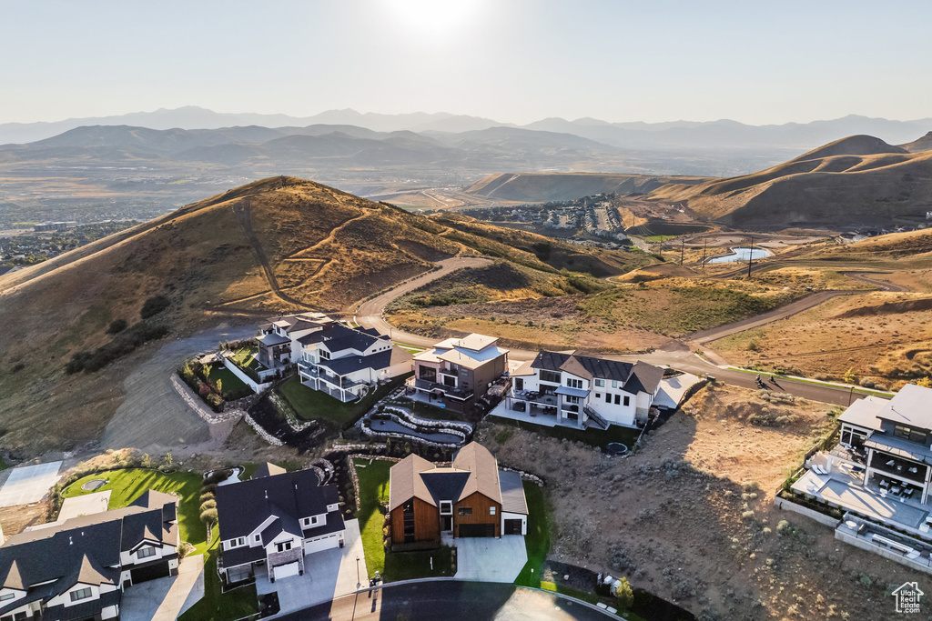 Birds eye view of property with a mountain view