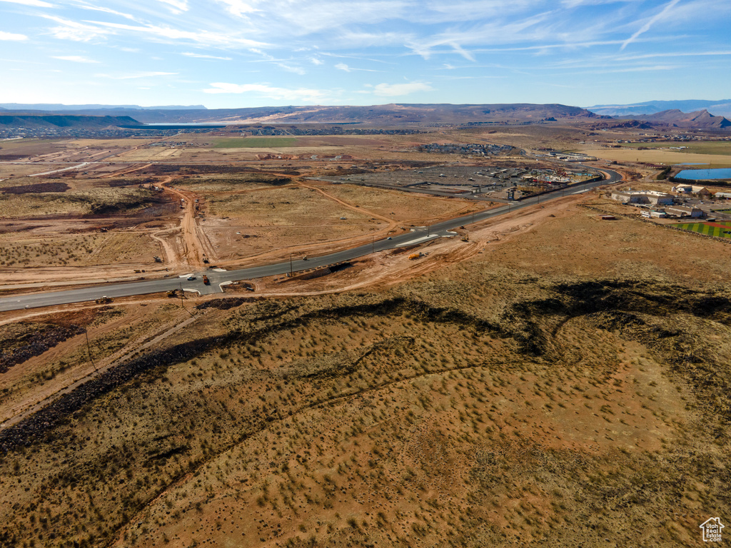 Birds eye view of property with a mountain view