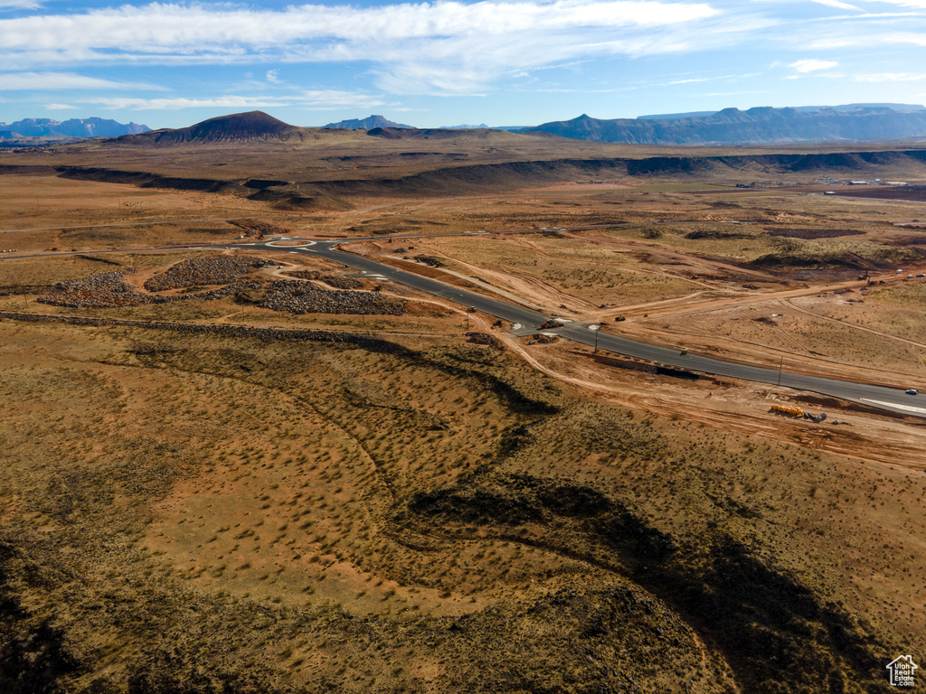 Birds eye view of property with a mountain view